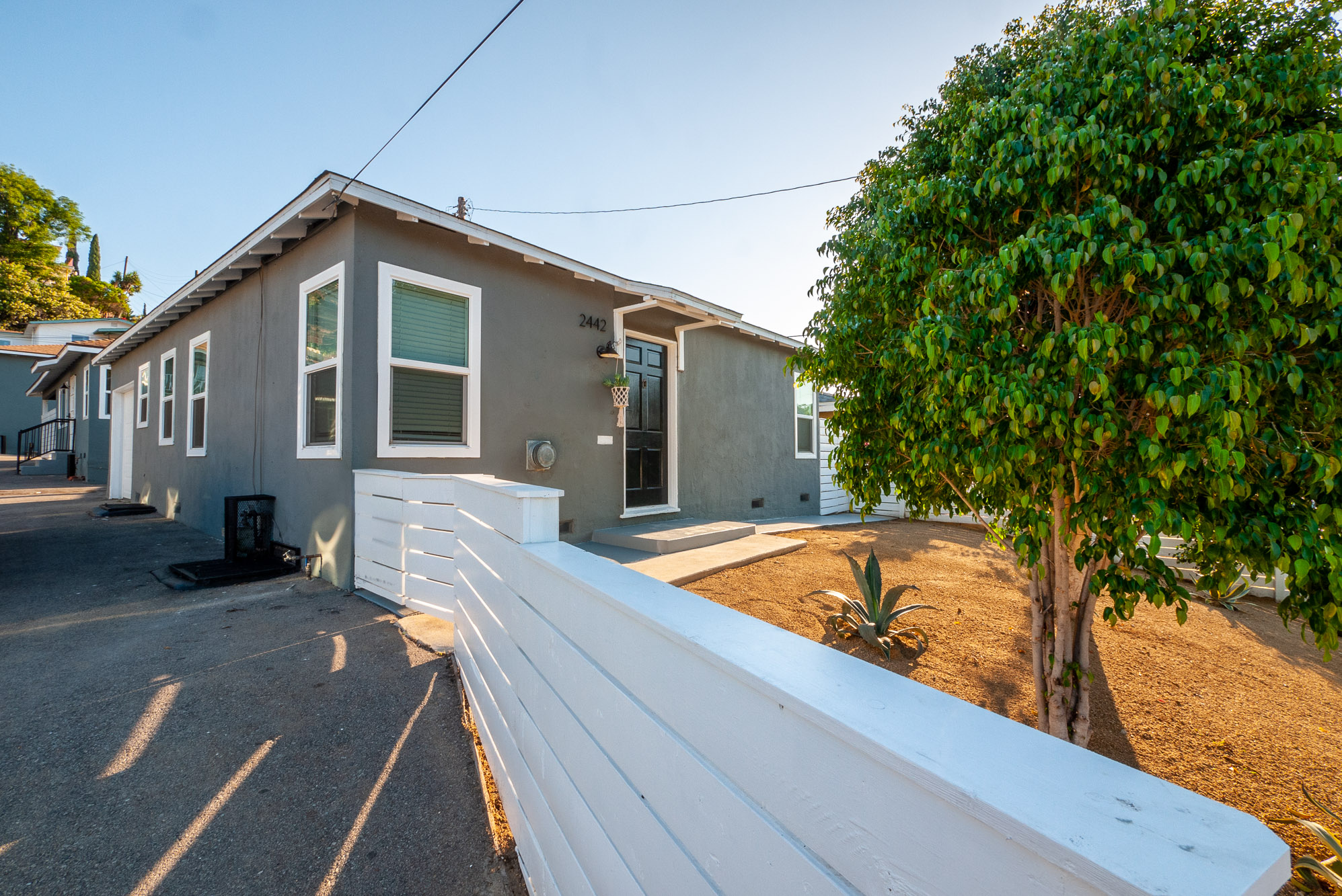 FREE-STANDING BUNGALOW | GARAGE | WASHER/DRYER | FENCED FRONT YARD AND PRIVATE BACK PATIO
