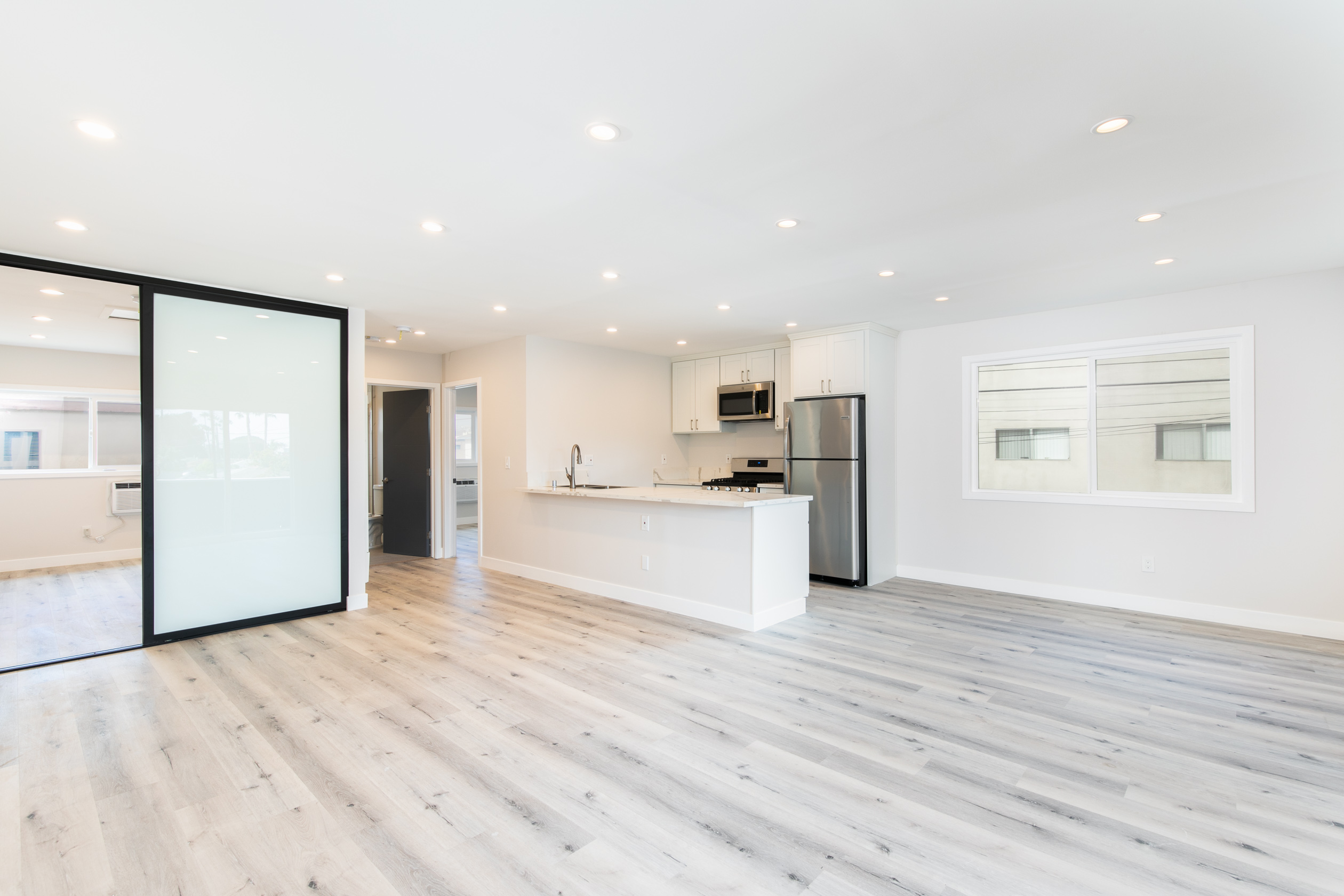 NOT YOUR BASIC ONE-BEDROOM! Upper 1BD/1BA Unit + Bonus Room! |Beautifully Updated | Laundry On Site | Parking Incl